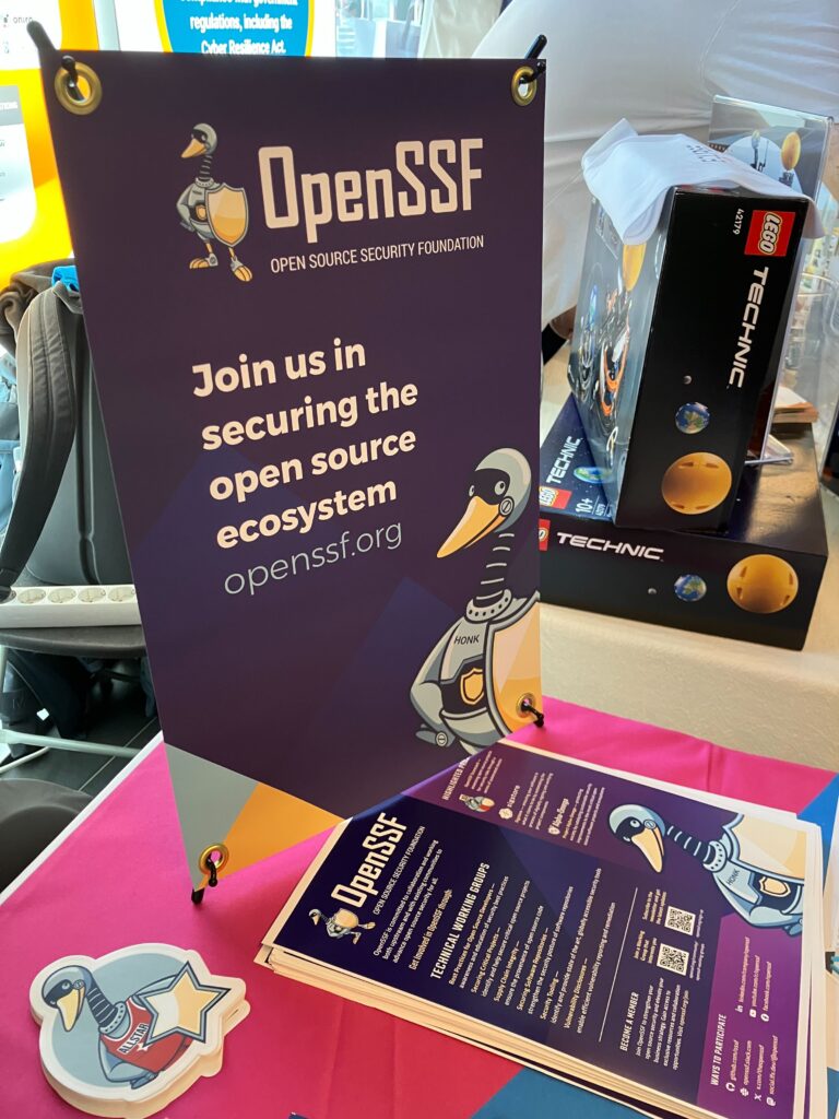 FOSDEM table with OpenSSF sign