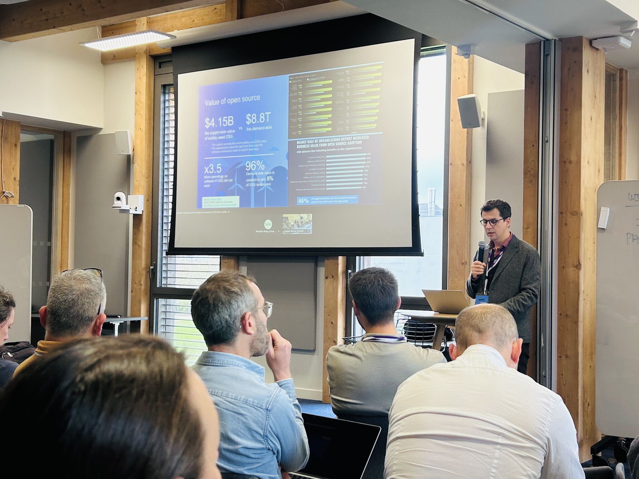 Madalin Neag, EU Policy Advisor, OpenSSF giving a talk at OSPOlogyLive Europe